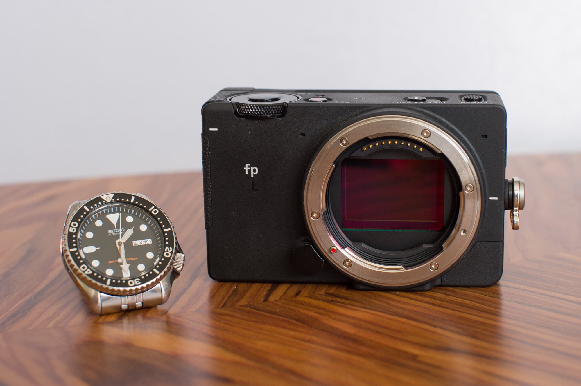 Sigma fp L i Seiko SKX